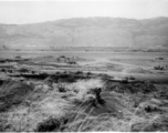 Overview of the American airbase at Yangkai (Yangjie) during WWII. Frank Bates notes, "Looking west across the valley. The newest planes' tail numbers are 336 & 340 and piloted by Alexander & Brillhart. Yangkai Army Air Base, China, early 1944." The 22nd and 491st Bombardment Squadrons arrived in January 1944 and shared the base with the 373rd Bomb Squadron (B-24s) for a few months. In the fall of 1944, the Japanese army overran the Liuzhou and Guilin bases, the 11th Bomb Squadron joined its "sister" units 