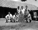 GIs with beer can pyramid during WWII.  Americans in the CBI. Probably India.