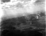 Smoke rises from probable American air attacks on Japanese ground troops, probably in Guangxi province, probably during the Japanese Ichigo campaign of 1944. 