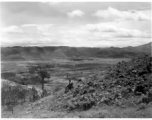 An American serviceman walking  on the hill above Yangkai air base, in Yunnan province, China, during WWII.