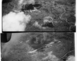 Aerial view of bombing of air base, likely in Burma. During WWII.