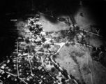 Bombing of small crossroads town in a region of savanna, either in Burma or French Indochina. During WWII.