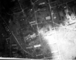 Bombing of small town with extensive bomb trenches in a region of savanna, either in Burma or French Indochina. During WWII.