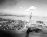 Large and inexplicable explosion near the Ninh-Bình railway bridge in French Indochina (Vietnam), during WWII. Ninh Bình is a small city in the Red River Delta of northern Vietnam, and along a critical rail route used by the Japanese.  Coordinates: 20°15'39.7"N 105°59'06.3"E