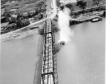 Bombing of Đò Lèn Bridge in Hà Trung Town in French Indochina (Vietnam), during WWII. In northern Vietnam, and along a critical rail route used by the Japanese.