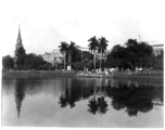 Buildings on waterfront.  Scenes in India witnessed by American GIs during WWII. For many Americans of that era, with their limited experience traveling, the everyday sights and sounds overseas were new, intriguing, and photo worthy.