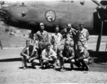 491st Bombardment Squadron mechanics - Gibbs, Butsika, McArdle, Lacher, Pete, Beausoleil, unknown, Kealy - at Yangkai in the spring of 1944.  Of special interest is the number of machine guns sticking from the nose of the "green house." The original B-25Ds had one flexible gun in the center, operated by the bombardier or navigator. Later, 'official' modifications would add two, mounted to the sides of the compartment. Here we also see two which are apparently mounted under the floor of the compartment. Obvi