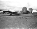 A very tired and very worn B-24 at an American air base in Yunnan province, China, during WWII. Notice that the tail has been capped and has no guns.