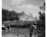 797th Engineer Forestry Company in Burma: Slow moving convoy through construction on the Burma Road.  During WWII.