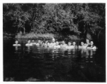 Engineers of the 797th Engineer Forestry Company pose while swimming in Burma.  During WWII.