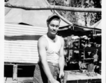 Engineer of the 797th Engineer Forestry Company in Burma, repairing skidding tongs.  During WWII.