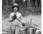 Engineer of the 797th Engineer Forestry Company in Burma, weaving a pulling eye in cable.  During WWII.