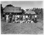 Local people in Burma near the 797th Engineer Forestry Company--A group of men pose in Burma.  During WWII.