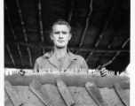 Engineer of the 797th Engineer Forestry Company in Burma, with saw in jig, being sharpened.  During WWII.