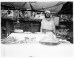 Men vending food in Burma or India.  Near the 797th Engineer Forestry Company.  During WWII.