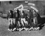 Crew of nine flyers stands before F-7A "My Assam Wagon," #42-64170.  24th Combat Mapping Squadron, 8th Photo Reconnaissance Group, 10th Air Force.