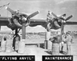 Engine maintenance F-7A/B-24 "The FLYING ANVIL." At Chanyi (Zhanyi), China.  24th Combat Mapping Squadron, 8th Photo Reconnaissance Group, 10th Air Force.