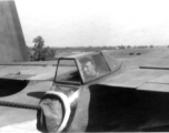 Jim Lane in tail gun (.50 cal.) put in B-25 #81, summer of 1943, Chaukulia, India.