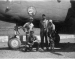 Pete Bertani, Peterson, Frank Bates, unknown, posing before a B-25 Mitchell in a revetment in China, likely Yangkai.