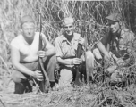 Men of 330th Troop Carrier, 9th CC, out hunting, stand in a field with carbines in the CBI during WWII.  Left to right: R. C. Werner, Milt Sobel, and K.J. Tolley.  From the collection of Arnold Wall. (Much appreciation to son D. W.)