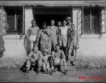 "The Adopted One--This Is A Group Of The 396th Guys Having Their Picture Taken With A Small Chinese Boy That We Adopted As A Mascot. " Caption courtesy of Elmer Bukey.