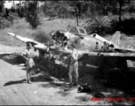 A destroyed Japanese fighter left over at the airbase after the Japanese retreat from Liuzhou. Photos taken by Robert F. Riese in or around Liuzhou city, Guangxi province, China, in 1945.