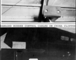 Flak damage to the B-24 "China Clipper" as photographed after the fact by Hal Geer, who had also been holding a camera on the plane at that location, at the waist window, when the plane was hit in flight, and the camera in his hands (and held to his face) had been destroyed by the flak, saving his life at the same time.