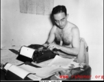 Teddy White at the typewriter during WWII.  From the collection of Hal Geer.