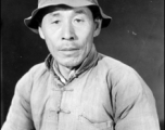 Chinese man in China poses for the photographer. During WWII.
