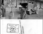 A weapon's carrier waiting to be loaded in front of Hostel #4 at the American airbase at Liuzhou. During WWII.  From the collection of Hal Geer.