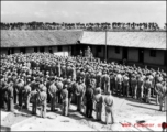 American servicemen listening to a speech in Yunnan province, probably near the 14th Air Force HQ outside of Kunming. 