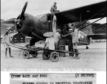 Chinese workers help service a C-64, loading fuel by hand crank, on August 1, 1944, somewhere in the China. 