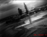 A large bomb explosion as seen from a bomber during allied bombing in the CBI.