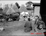 People in a small village in China, probably in Yunnan province.