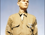 An American flyer in China poses with an award pinned to his chest. During WWII.