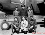 Unidentified aircrew of the 491st Bombardment Squadron (Ringer Squadron) stand beside aircraft "43-4481", a B-25H, at Yangkai Air Base, China. The squadron assigned, combat id number is painted on the nose wheel, '81'.