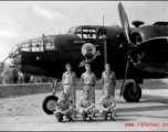 Unidentified members, probably an aircrew, beside a B-25C of the 491st Bombardment Squadron at Chakulia, India, sometime in 1943.