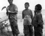 Local people in China: Villages work fields near Yangkai, Yunnan, China, during WWII.