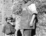 Local people in China: A woman and child near Yangkai, Yunnan, China, during WWII.