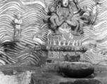 Figure in a Buddhist temple in Yunnan province, China, during WWII.