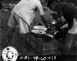 September 28, 1944  During WWII, food sellers from Liuchow, China, set up stands to cater to the hungry refugees from Kweilin (Guilin) escaping the Japanese drive into southwest China.  Photo by Lt. N. J. Dain
