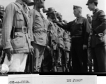 U. S. Brig. Gen. Haig Shekerjian, Torrenten, Conn., C.W.S., and Col. Li Jen Tsi, C.W., Inspect Chinese troops at I.T.C. during WWII.