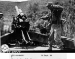 September 14, 1944  Pvt. W. E. Shemorry, Williston, N. Dakota, about to fire 150MM gun Howitzer, 10th Artiillary Regiment 11th A/G, firing on Lungling.