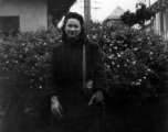 Local people in Yunnan province, China: An elite woman poses for the camera during WWII.