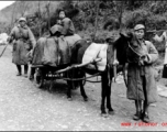 Refugees fleeing during the evacuation before the Japanese Ichigo advance in 1944, in Guangxi province.