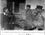 A "Red Cross girl" and American officers chat on a street in Kunming during WWII, on January 2, 1945. In the background is a jeep for ATC. 1340th AAFBU ATC Kunming China.  Photo from R. Heinmann.