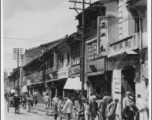 Street scene in a China city, mostly likely Kunming. During WWII.