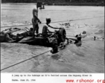 GIs float a jeep--wrapped in canvas to give it buoyancy--across the Moguang River in Burma, June 20, 1944.  Photo from Robert L. Cowan. An identical image was submitted by Raimon B. Cary.