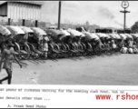 Rickshaws lined up awaiting evening trade in India or Burma during WWII.  Photo from A. Frank Bond.