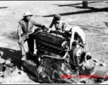 Engineers unwrap and prep a new engine in the CBI during WWII.